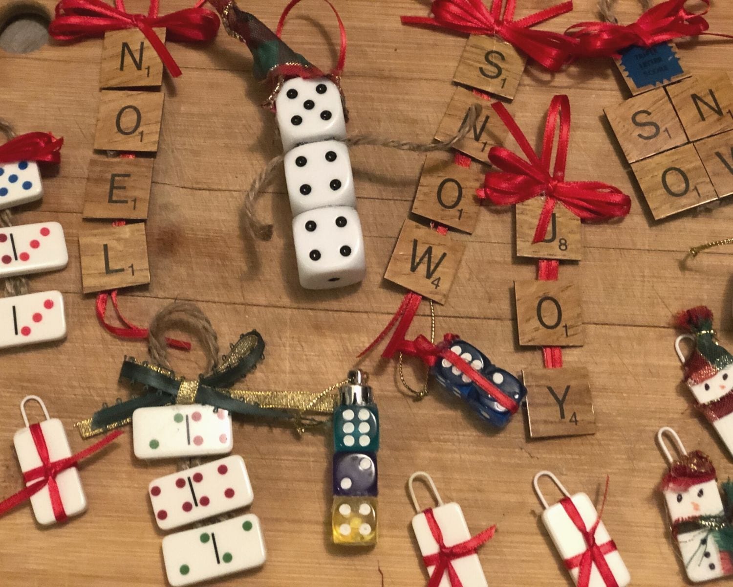 Love to play games?  With a few simple craft supplies and a little imagination, you can create Christmas ornaments using game pieces.